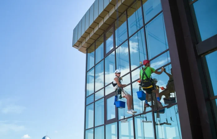 clean jobsite home protection industrial mountaineering worker cleaning window o