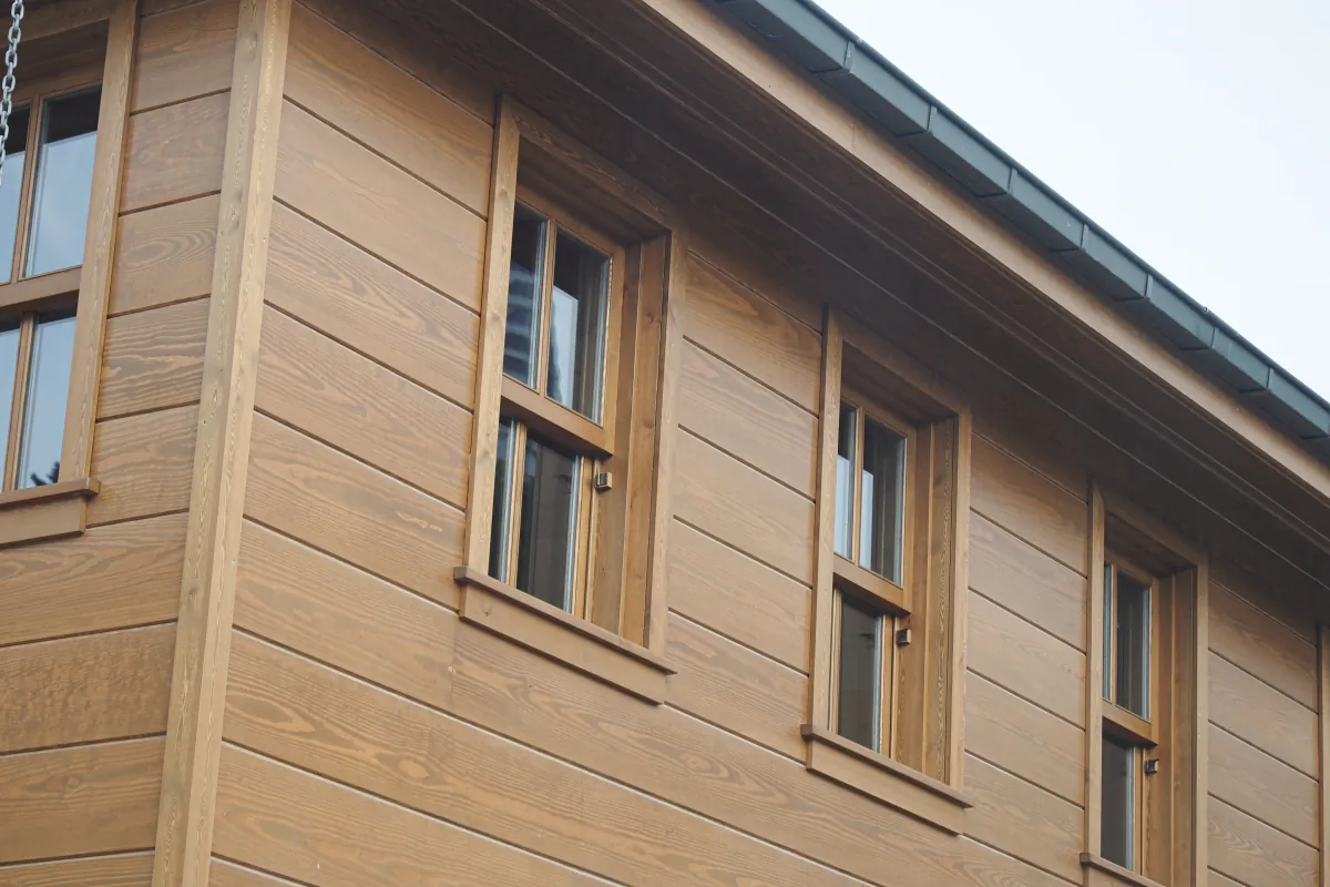 engineered wood siding establish shot of a old wooden house