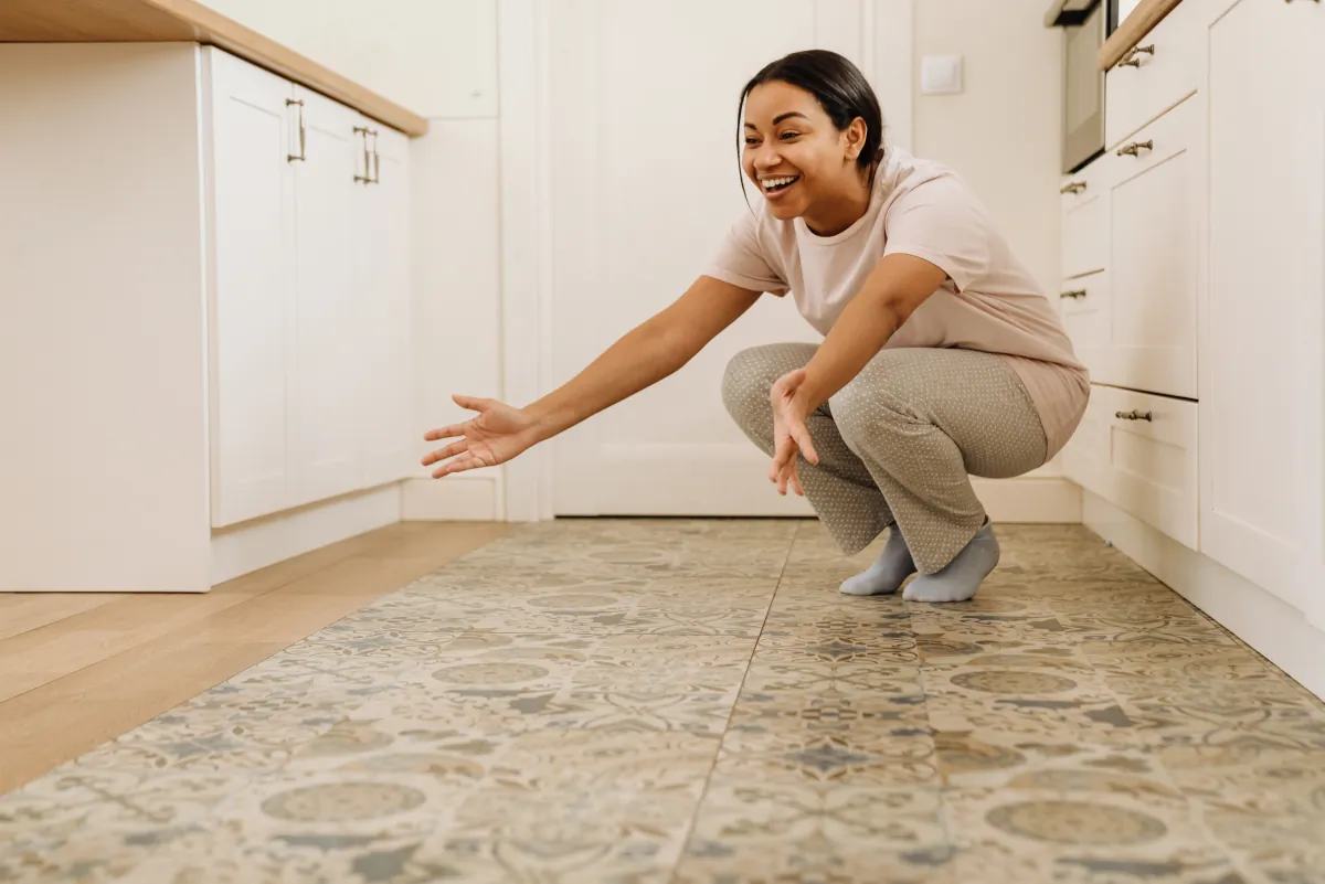 kitchen flooring young hispanic woman smiling stretching her ar