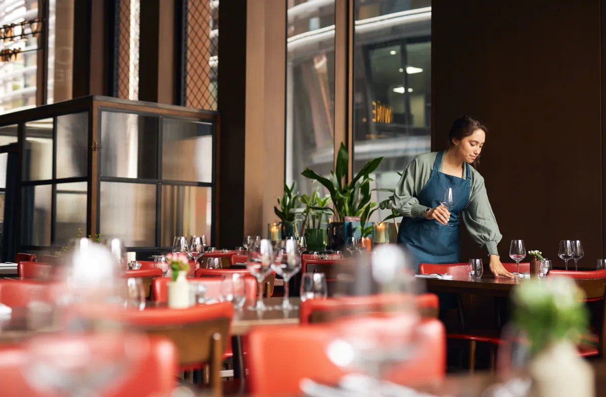 restaurant build outs female waitress setting tables