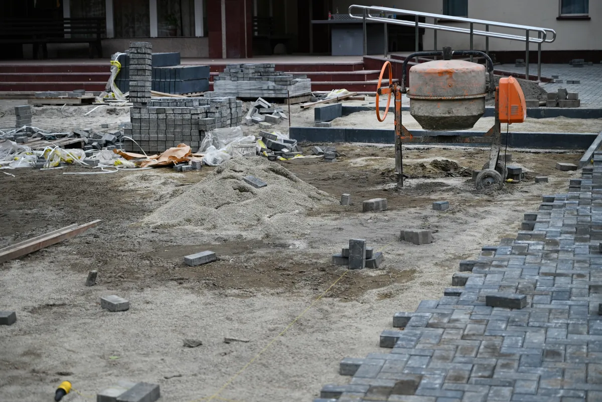 shopping center improvement low angle view male hands measuring levelin