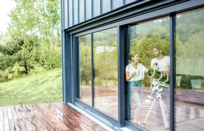 sliding window couple with telescope at home