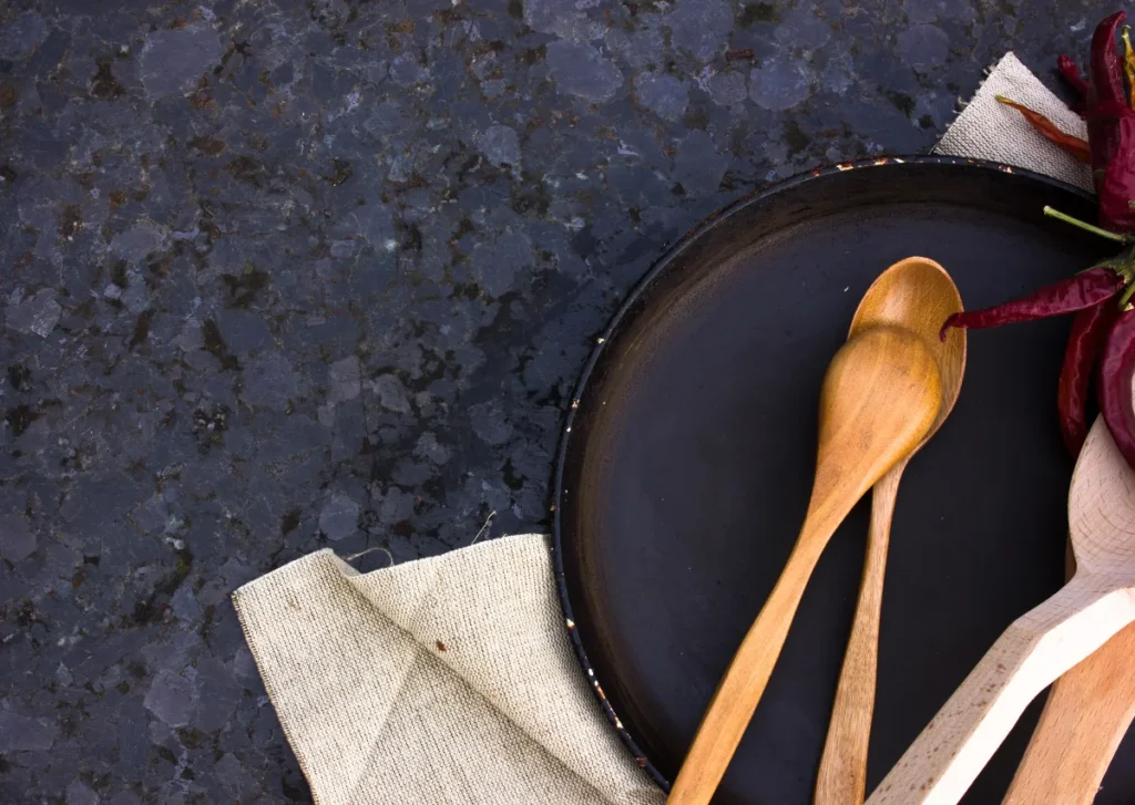 soapstone countertops old wooden kitchen utensils or cooking tools and b