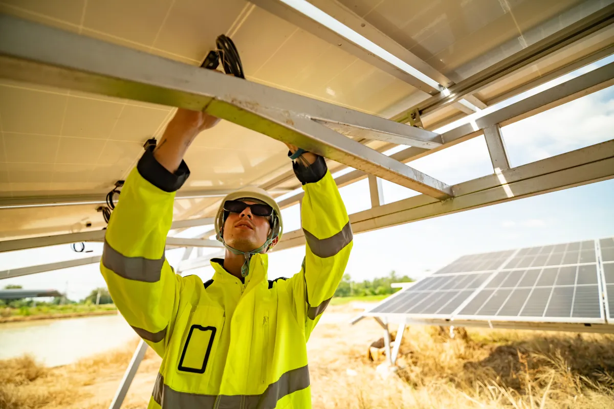 solar panel technicians installing photovoltaic solar panels