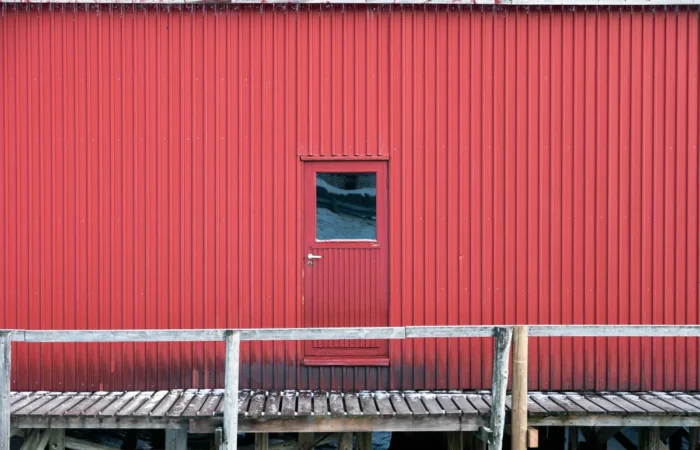 vertical siding metallic door and wall of warehouse on coastline i