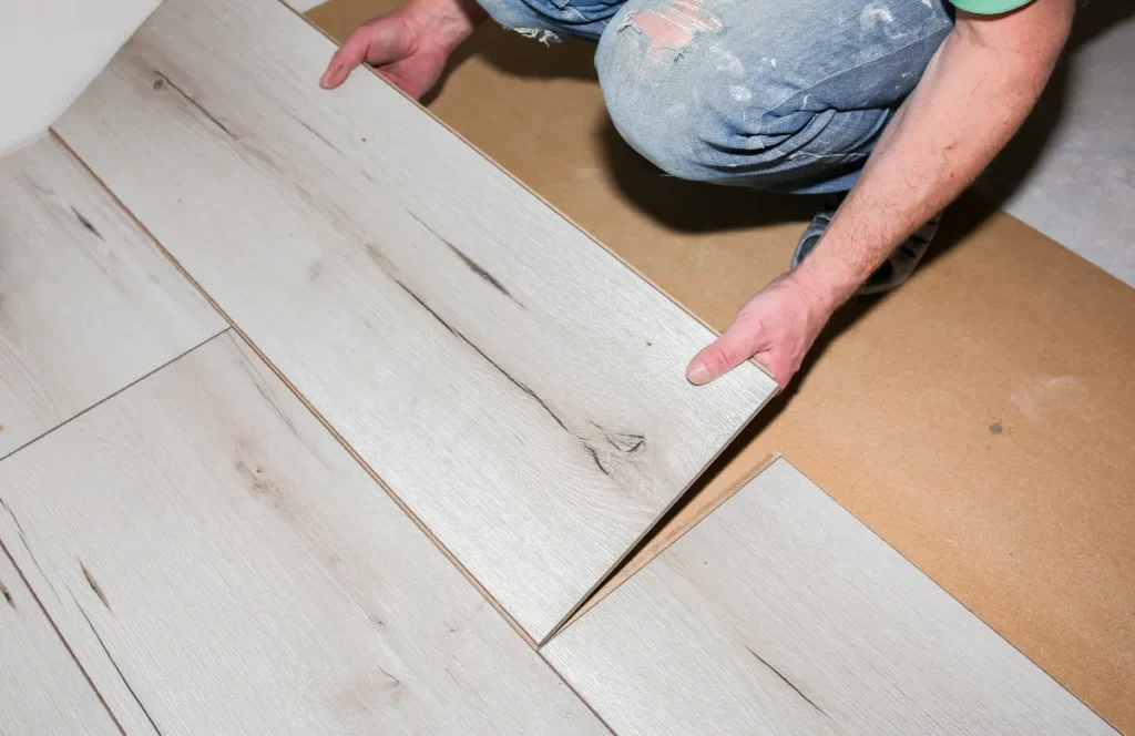 vinyl tile laminate worker making laminate flooring apartment main