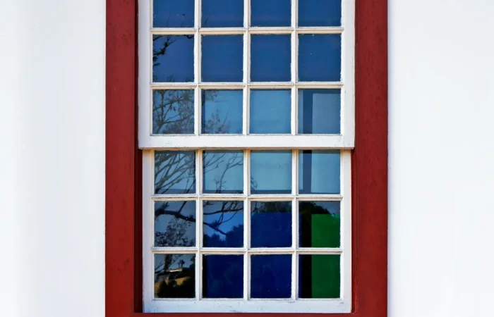 window colonial window on white facade