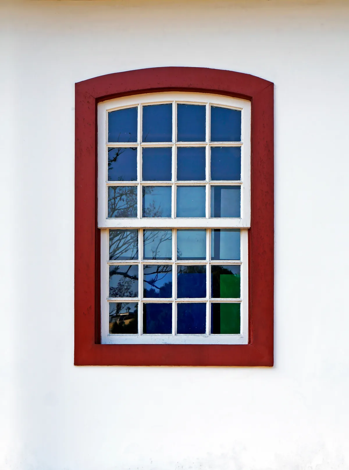 window colonial window on white facade
