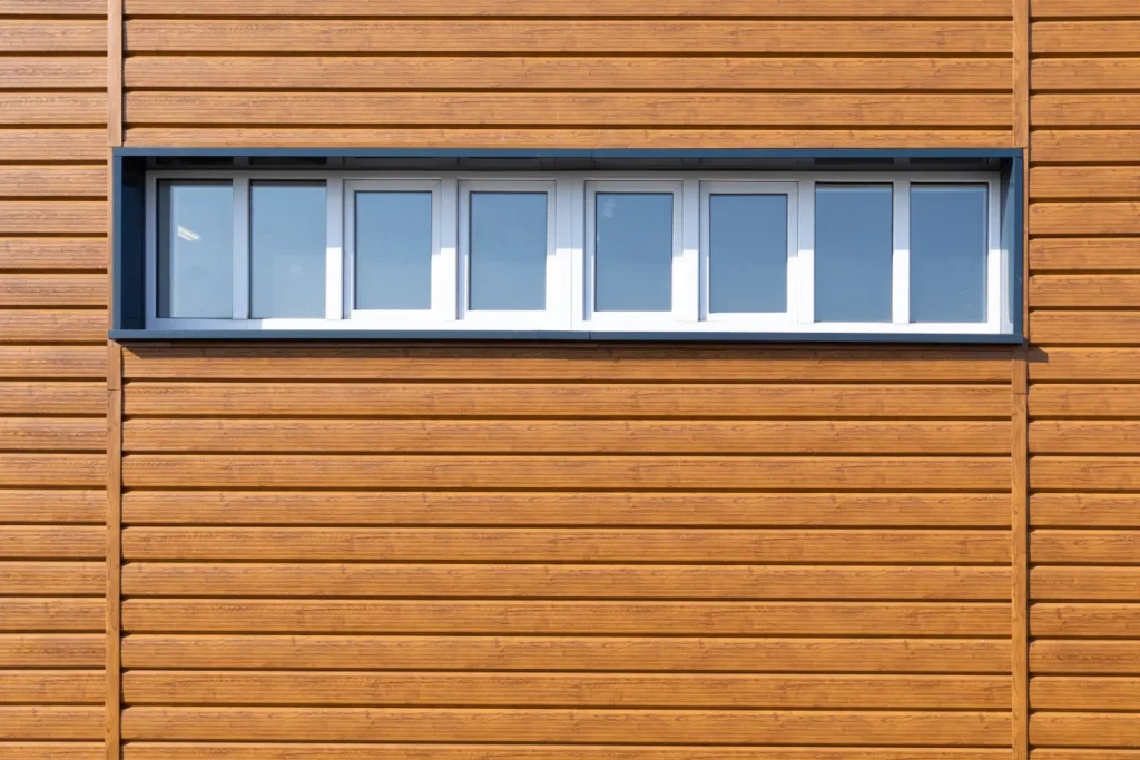 wood siding wooden wall background small windows light w