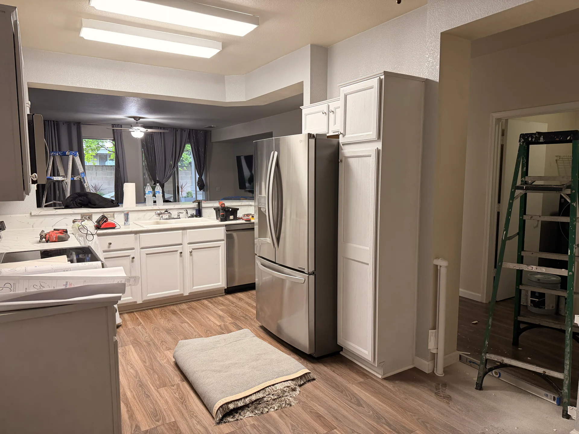 kitchen before remodeling during early construction and demolition preparation.