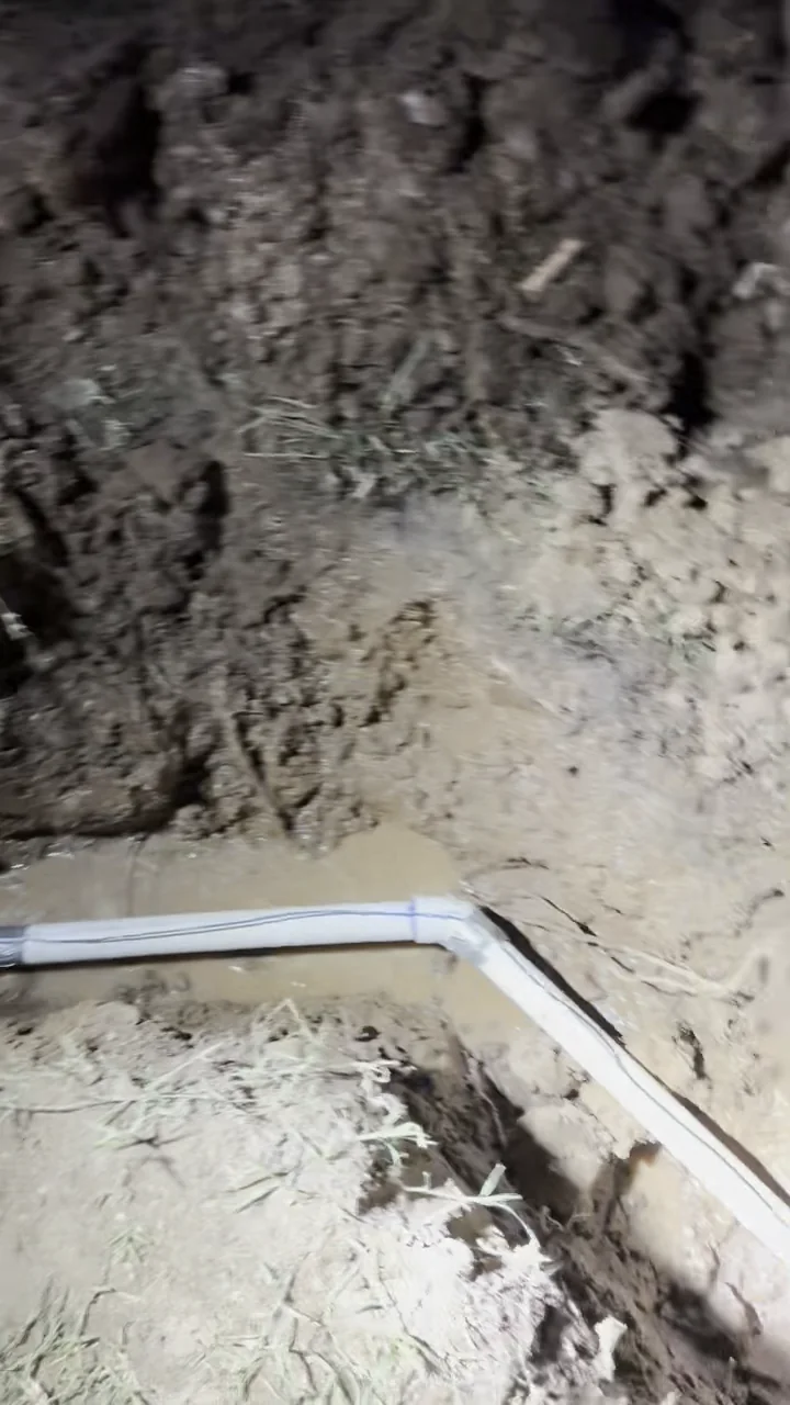 New main water line routed through an open trench in Folsom with a documented directional turn.