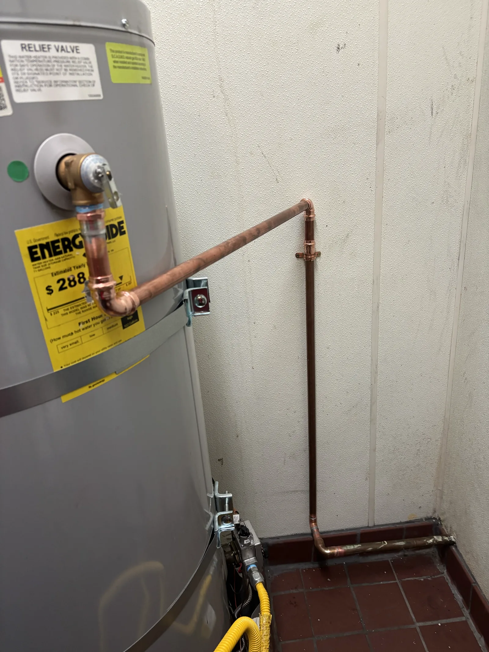 Existing commercial gas water heater documented after repair work at an Old Sacramento restaurant