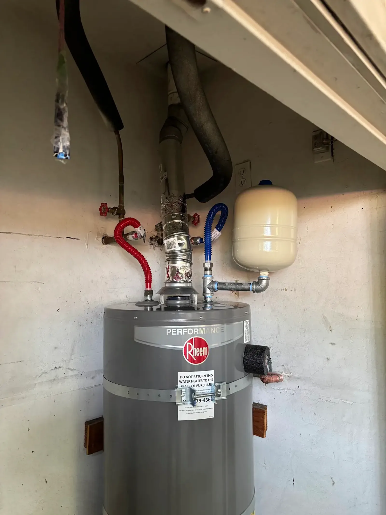 Upper section of the Roseville replacement showing the expansion tank, water connectors, and vent connector.