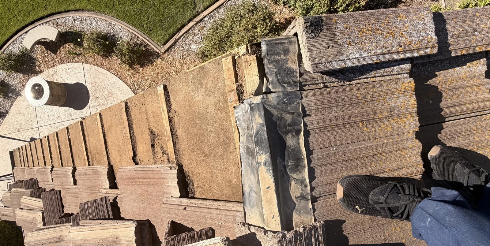 Roof junction and flashing detail during the local tile roof repair in Elk Grove